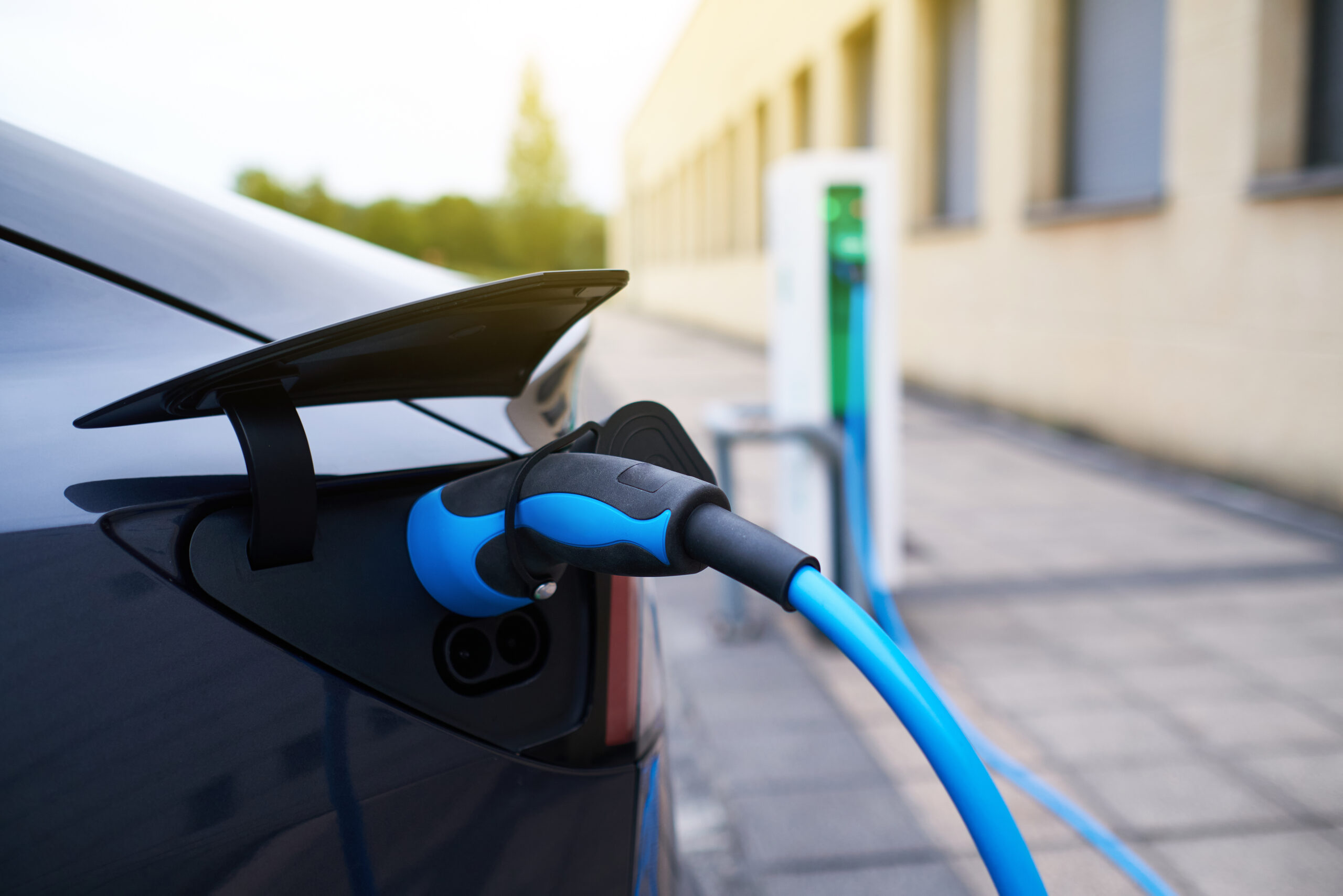 electric car refueling at a charging station