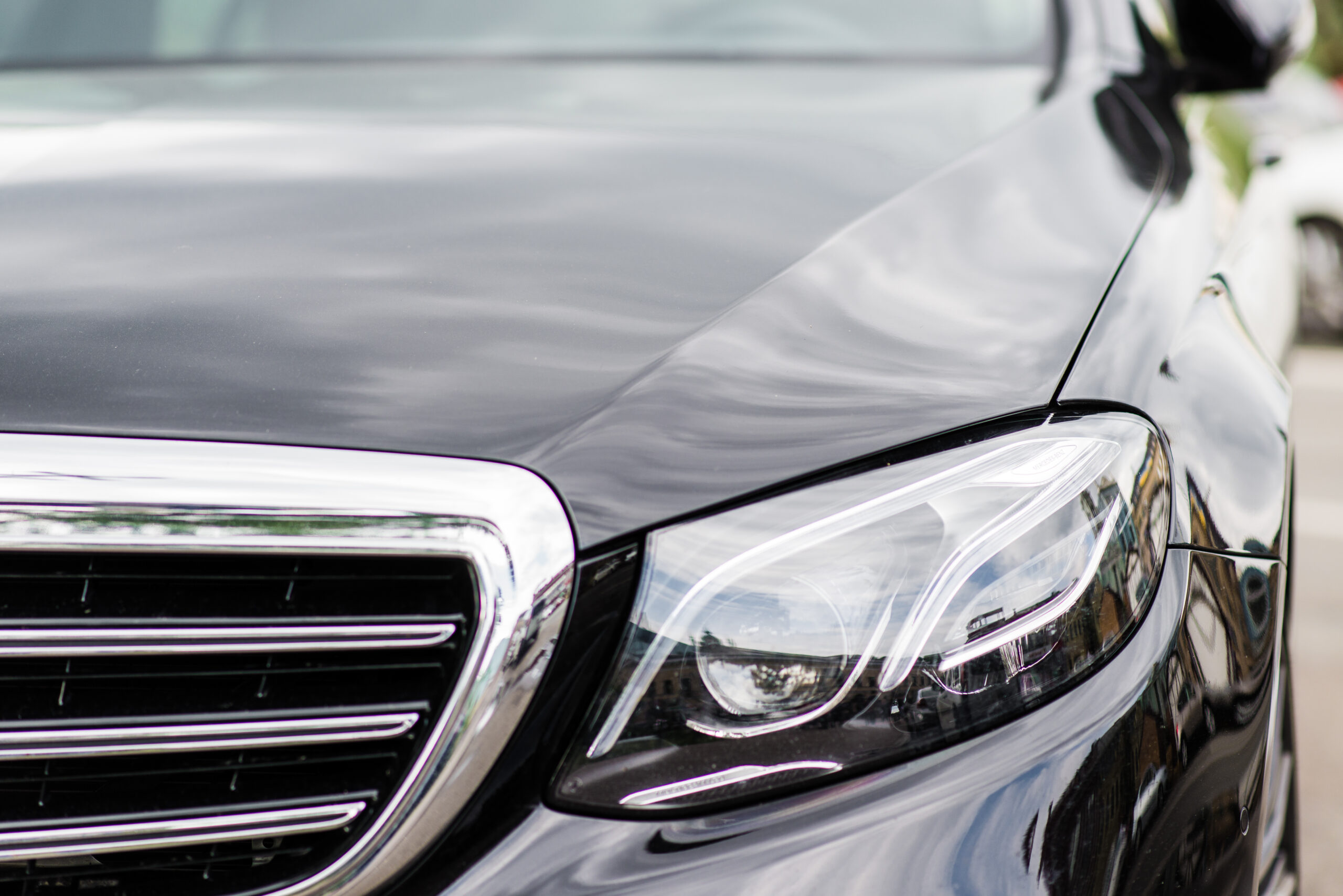 Headlights of black modern car